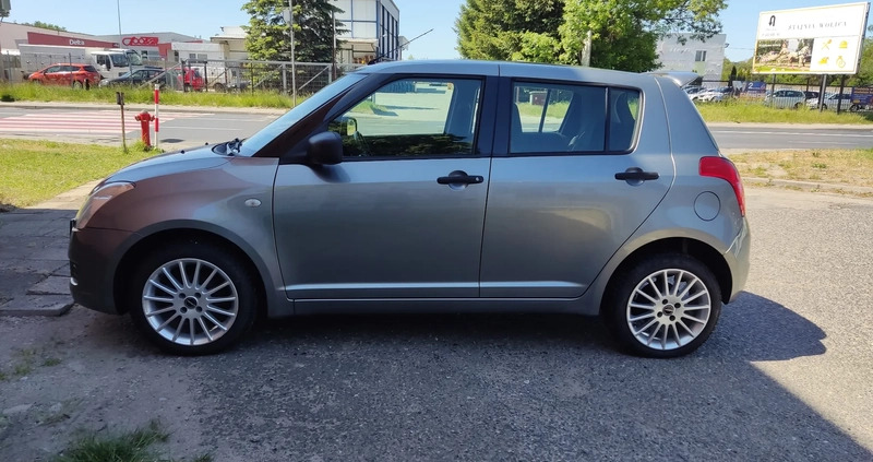 Suzuki Swift cena 14900 przebieg: 150000, rok produkcji 2009 z Lidzbark małe 277